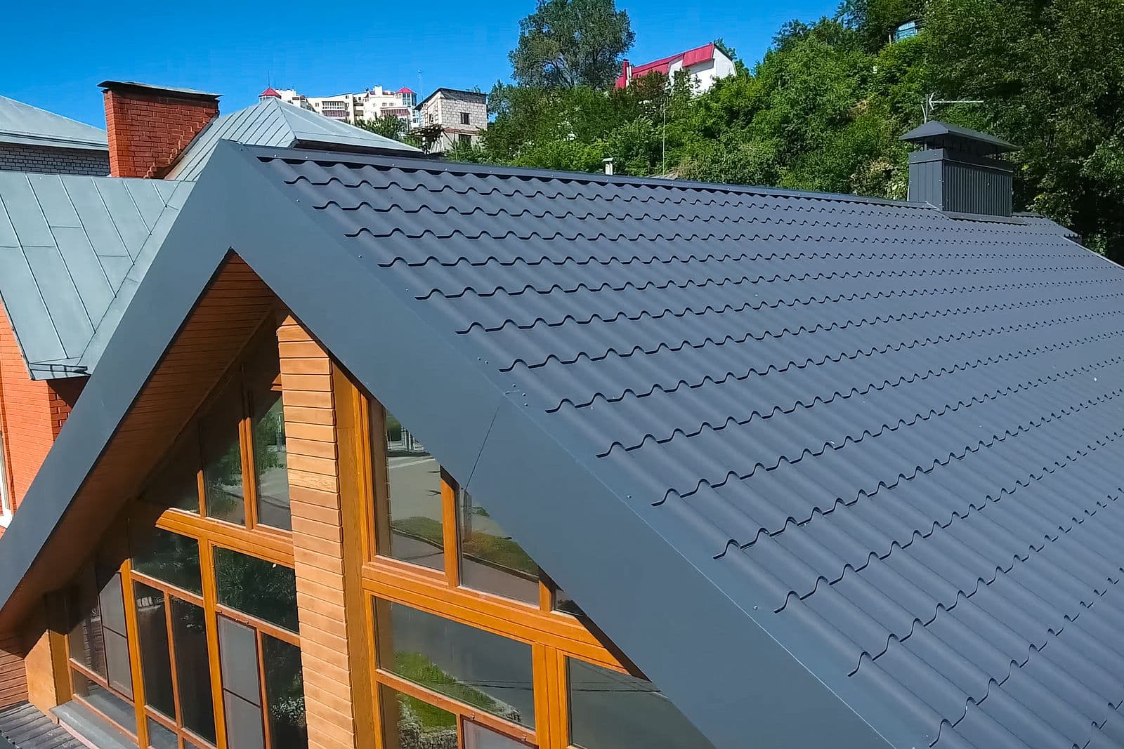 A house with a gray metal roof.