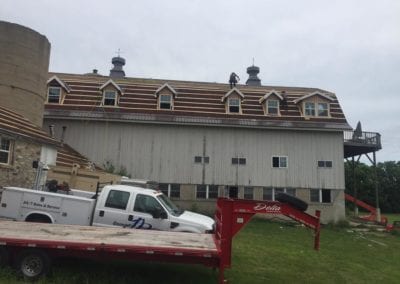 roofing-contractors-working-in-barn