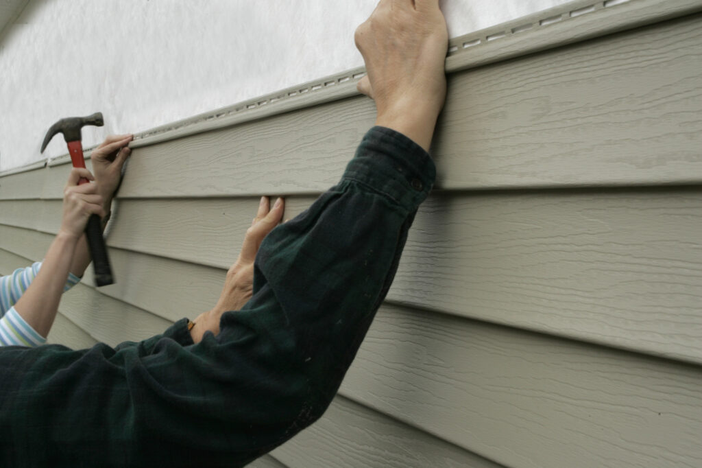 installing siding on a house